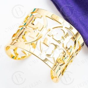 Tory Burch cuff- only worn once but does have natural wear from age.